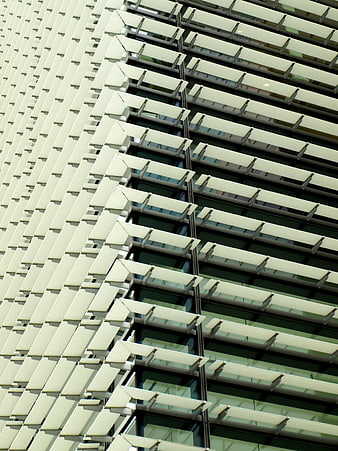 Modern Building Facade with Geometric White Louvers