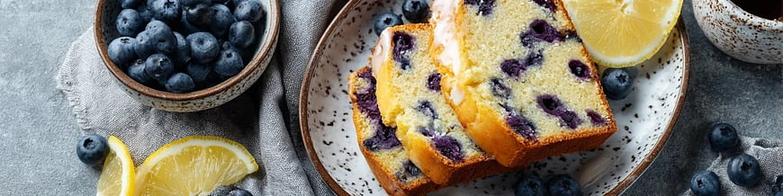 Sliced Blueberry Lemon Loaf Cake with Fresh Berries