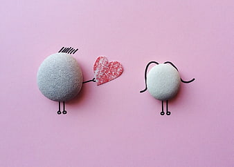 Cute Stone Characters with Heart on Pink Background
