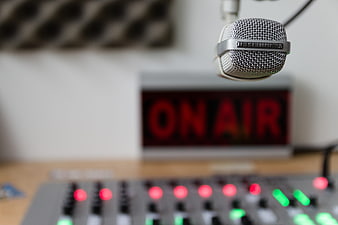 Professional Sennheiser Microphone in Recording Studio with On Air Sign