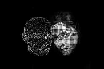 Abstract wireframe human faces representing artificial intelligence and psychology