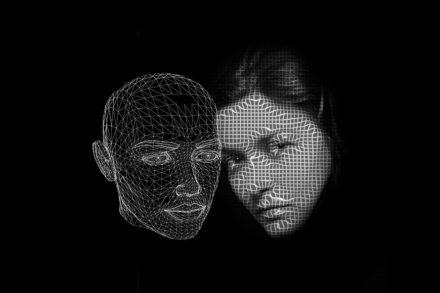 Abstract wireframe human faces representing artificial intelligence and psychology