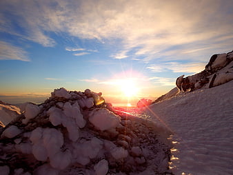 Sunset over Snowy Mountain Ridge in Kamchatka