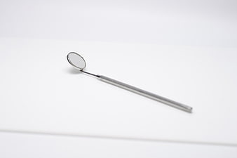 Dental Mirror on White Background
