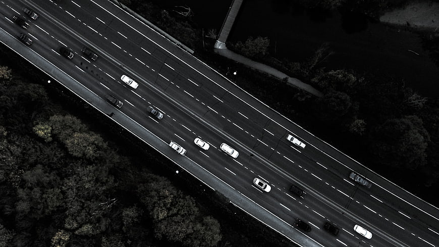 Aerial Black and White View of Cars on Highway