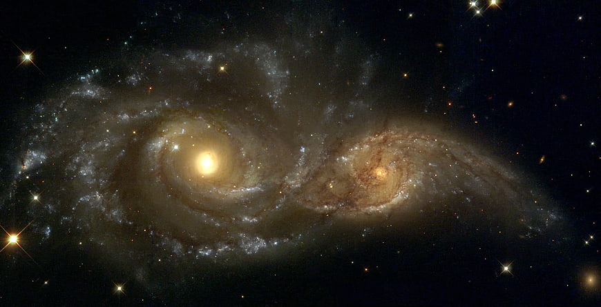Interacting Spiral Galaxies NGC 2207 and IC 2163 in Deep Space