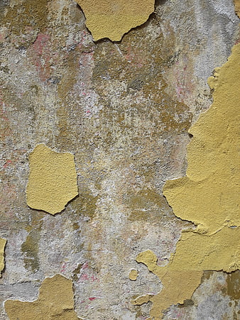 Textured Old Wall with Peeling Yellow Paint Background