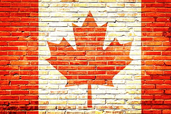 Canadian flag painted on red brick wall texture
