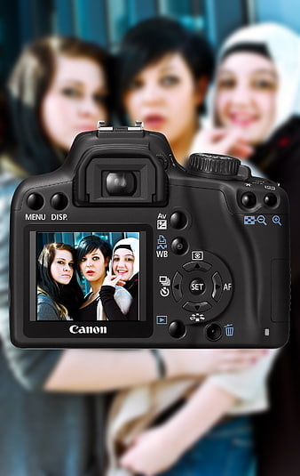 Canon DSLR Camera Displaying Photo of Three Women