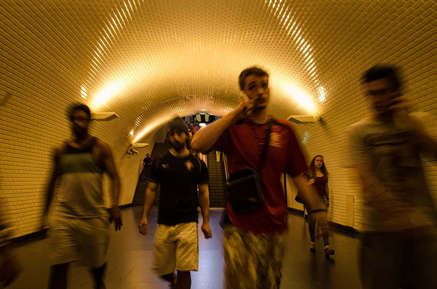 Motion Blur of People Walking in Subway Tunnel