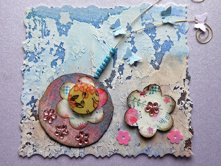 Handcrafted shabby chic card with vintage flowers and butterflies