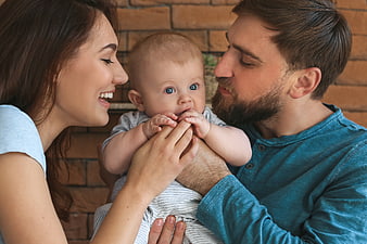 Happy Family Portrait with Baby and Parents