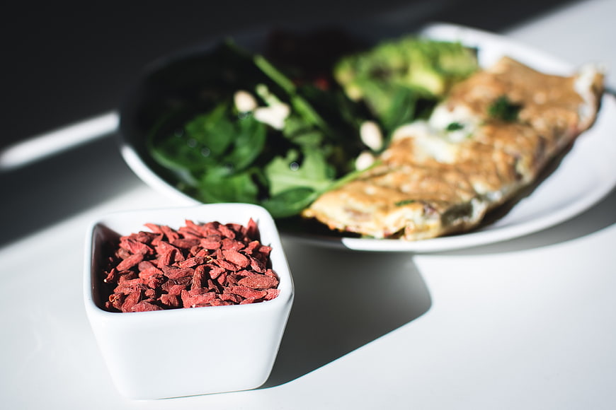Healthy Breakfast with Omelet, Salad, and Goji Berries
