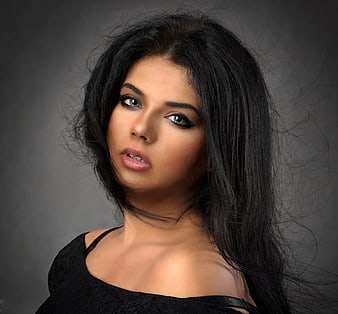 Sensual Portrait of Woman with Dark Hair and Smoky Eyes