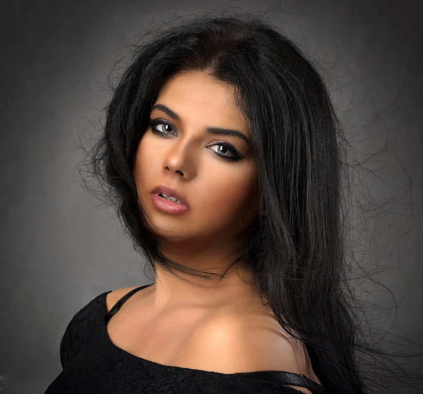 Sensual Portrait of Woman with Dark Hair and Smoky Eyes