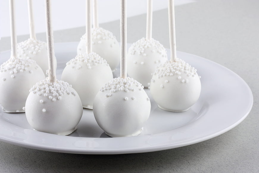 White Chocolate Cake Pops with Sprinkles on Plate