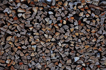 Stacked Firewood Logs Texture Background