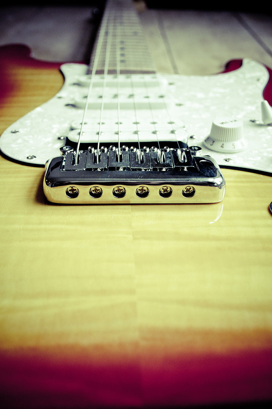 Close-up of Vintage Electric Guitar Bridge and Strings
