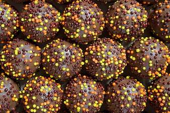 Close-up of chocolate easter eggs with colorful sprinkles