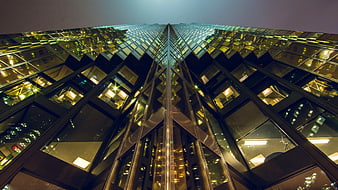 Low Angle Night View of Modern Glass Skyscraper
