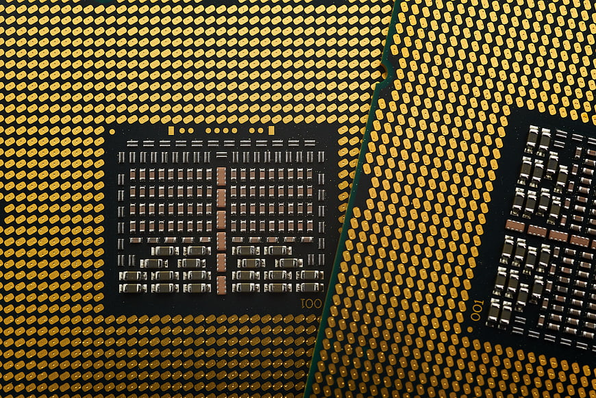 Macro Close-Up of Gold CPU Processor Pins and Contacts
