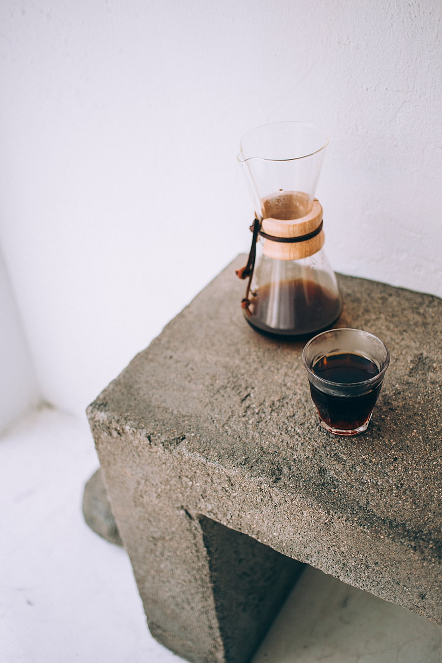 Pour-over coffee on rustic concrete table