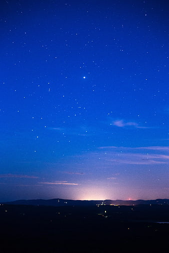 Starry Night Sky Over Mountain Silhouette