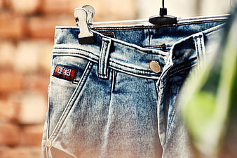 Close-up of Washed Blue Jeans on Hanger