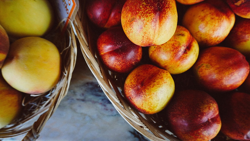 Fresh Nectarines in Wicker Baskets