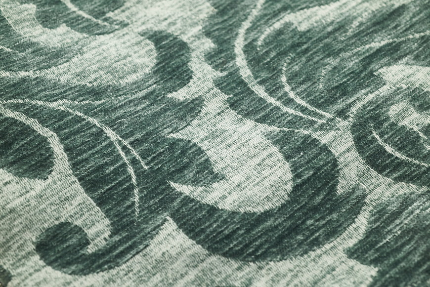 Close-up of Green Woven Fabric with Floral Pattern
