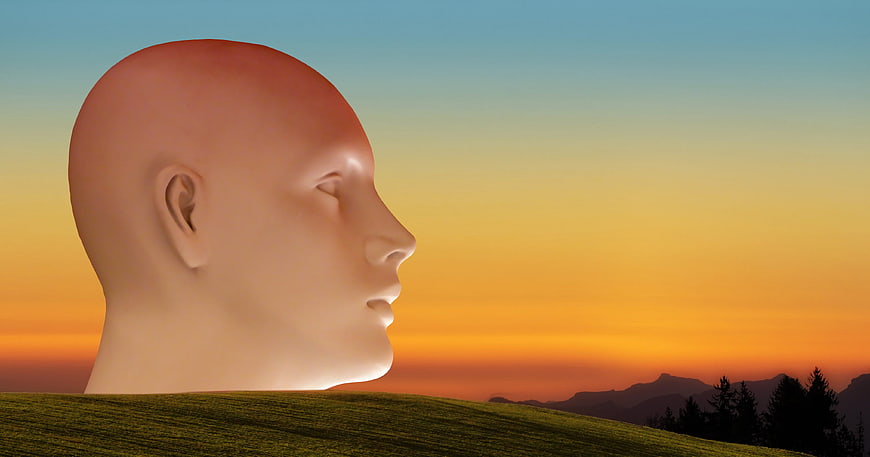 3D Human Head Profile Against Sunset Sky And Mountain Landscape