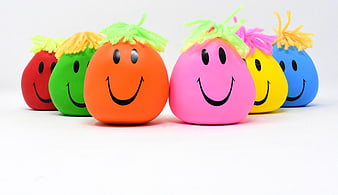 Colorful smiley face stress balls with pipe cleaner hair