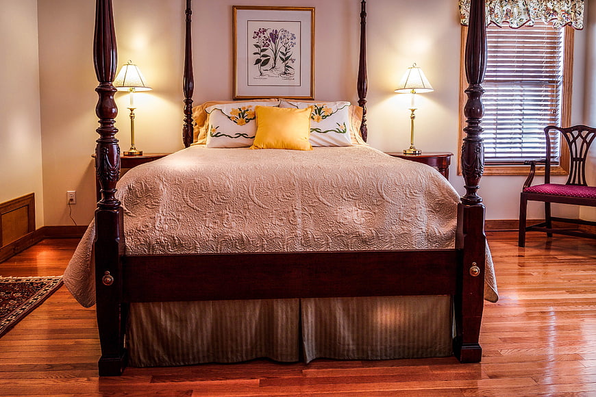 Traditional Four-Poster Bedroom with Hardwood Floors