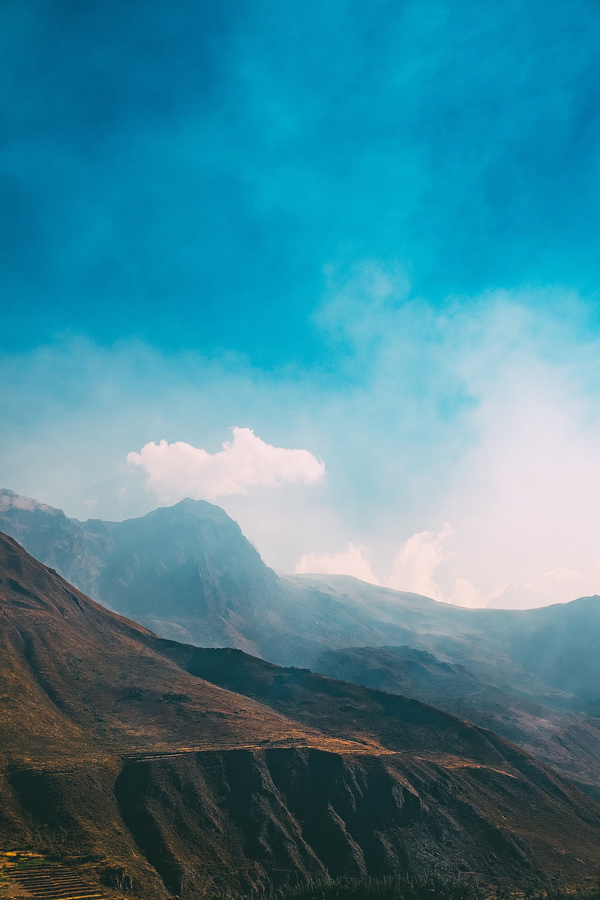 Majestic mountain landscape with blue sky and clouds