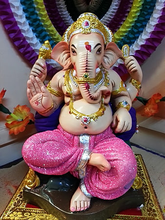 Colorful Ganesha Idol with Glittering Pink Garments