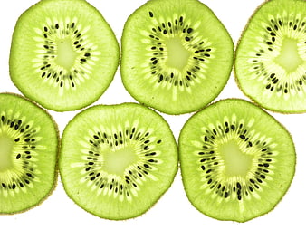 Sliced Kiwi Fruit Pattern On White Background