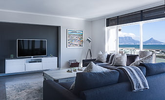 Modern Minimalist Living Room With Sea View And Contemporary Furniture