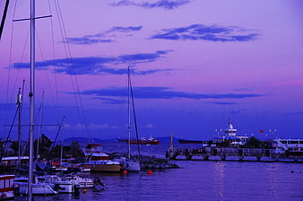 Sailboats in Harbor at Twilight with Purple Sky