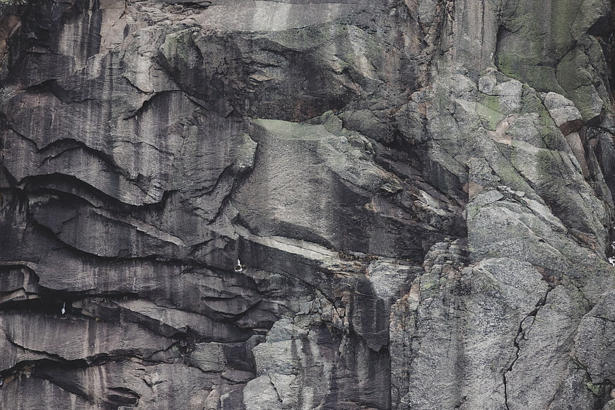 Rugged Rock Cliff Face Texture with Weathered Stone Layers