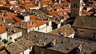 Aerial view of Dubrovnik's historic terracotta rooftops and stone architecture