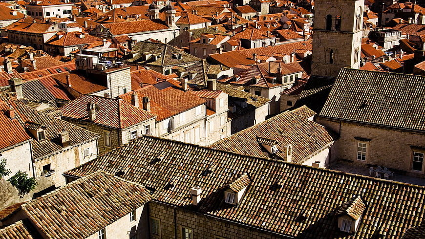 Aerial view of Dubrovnik's historic terracotta rooftops and stone architecture