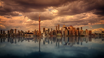 Toronto Skyline Reflection at Sunset with Dramatic Clouds
