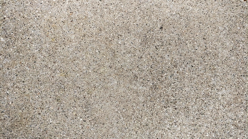 Close-up texture of rough gray concrete surface