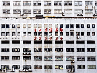 Urban Architecture with Chinese Characters on White Facade