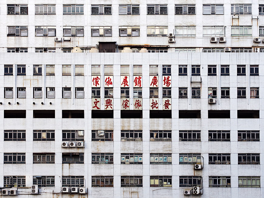 Urban Architecture with Chinese Characters on White Facade