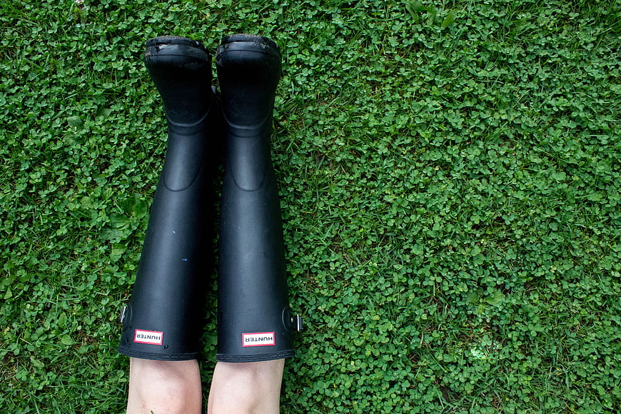 Black Hunter Boots on Green Grass Field