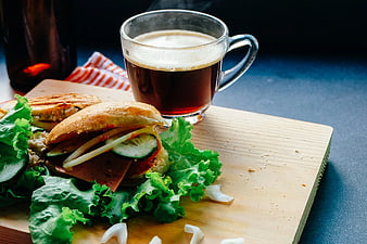 Fresh Sandwich and Hot Coffee on Wooden Board