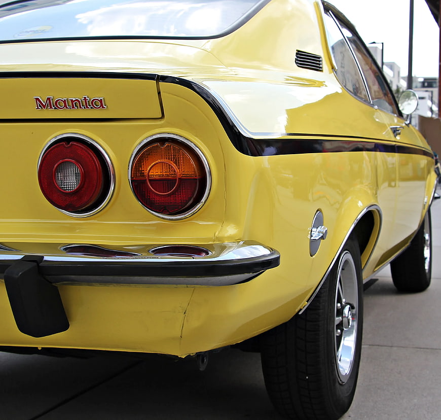 Rear View of Classic Yellow Manta Muscle Car