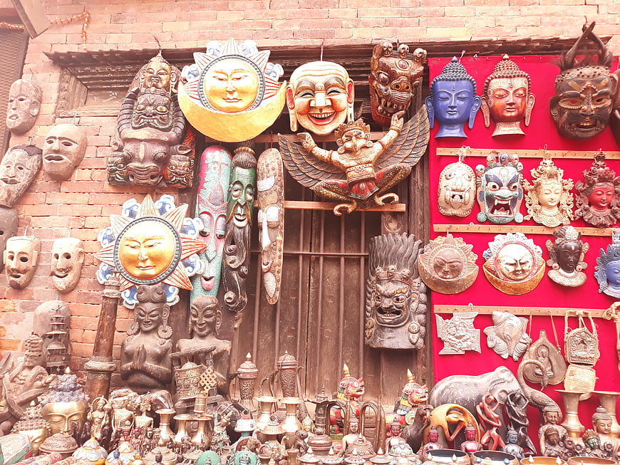 Traditional Nepalese Wooden Masks and Statues for Sale