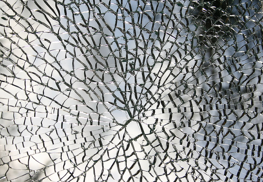 Close-Up Texture Of Shattered Cracked Glass Pane